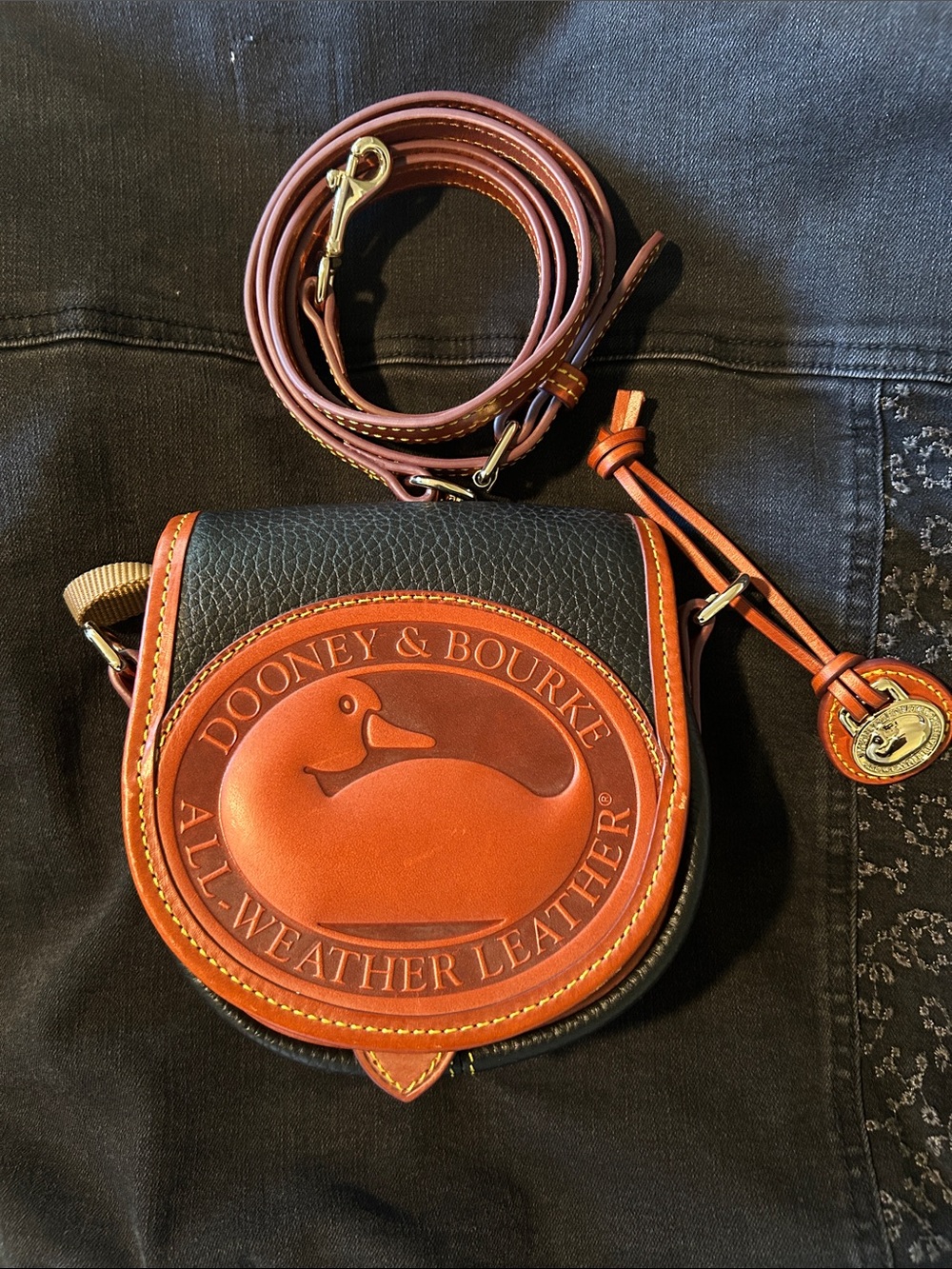 Dooney & Bourke Black and Brown All-Weather Leather Saddle Crossbody - NWOT